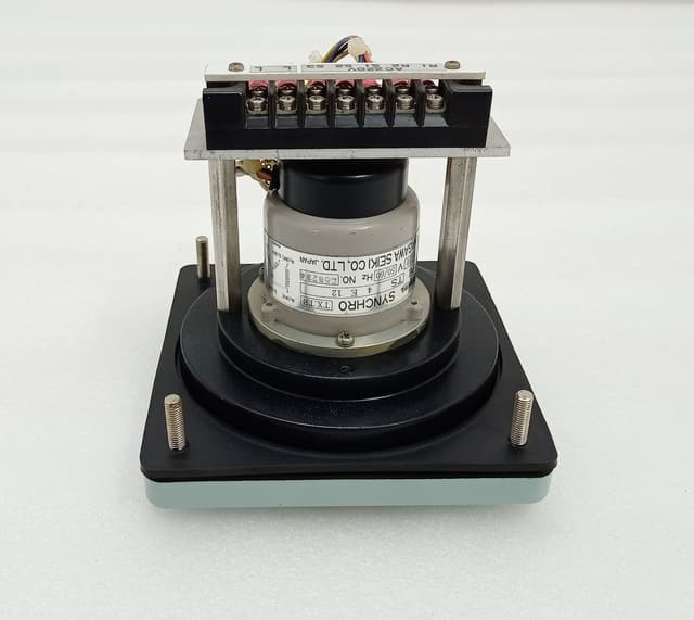 KURAMOTO Rudder Angle Indicator 70-0-70 Port/Starbd w TAMAGAWA TS4E12 Sync Motor KURAMOTO INSTRUMENT Marine Rudder Angle Indicator 70-0-70 Port/Starboard Marine Rudder Angle Indicator (RAI) KURAMOTO INSTRUMENT Marine Rudder Angle Indicator 70-0-70 Port/Starboard NO.876957-3 Vintage Marine Ship Gauge Synchro Dial / Kuramoto Tamagawa Seiki Indicator For sale is a genuine, high-grade Kuramoto Instrument Manufacturing Co., Ltd. Marine Rudder Angle Indicator loop dial face. This Japanese legacy navigation instrument features an expanded 70-0-70 degree scale for both Port (Red) and Starboard (Green) rudder position tracking. TAMAGAWA SEIKI TS4E12 Marine Synchro Rudder Angle Indicator Kuramoto 220V 70-0-70 Kuramoto Marine Rudder Gauge Meter TS4E12 Tamagawa Seiki Synchro Motor